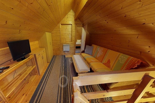 Foto van Chalet Bodensdorf bij Gerlitzen Alpe - Vakantiehuis in Bodensdorf am Ossiachersee - LivingRoom