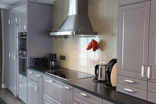 Foto van Bloesemhuis met tuin in Haspengouw - Vakantiehuis in Heers - Kitchen
