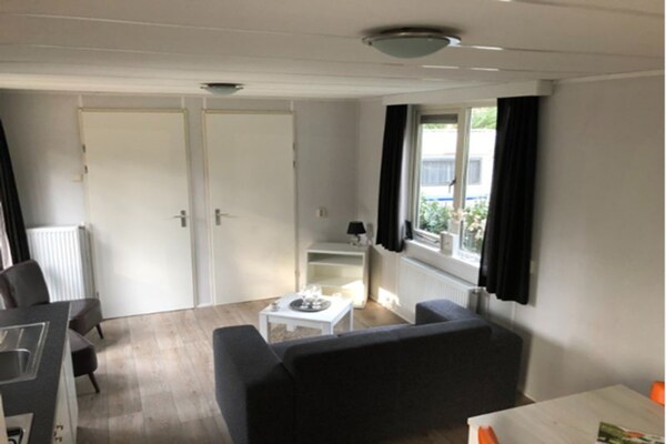 Foto van Ruime Chalet in Antwerpen - Vakantiehuis in Wechelderzande (Lille) - LivingRoom