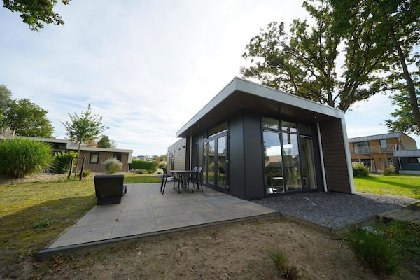 Foto van Modern hondvriendelijk Antwerp Chalet voor 4p - Vakantiehuis in Mol - ExteriorSummer