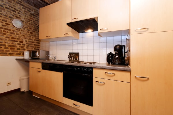 Foto van Mooi appartement in monumentale carré-boerderij tussen Luik en Maastricht - Kitchen