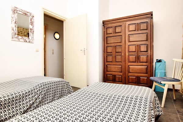 Foto van Mooi appartement in monumentale carré-boerderij tussen Luik en Maastricht - BedRoom