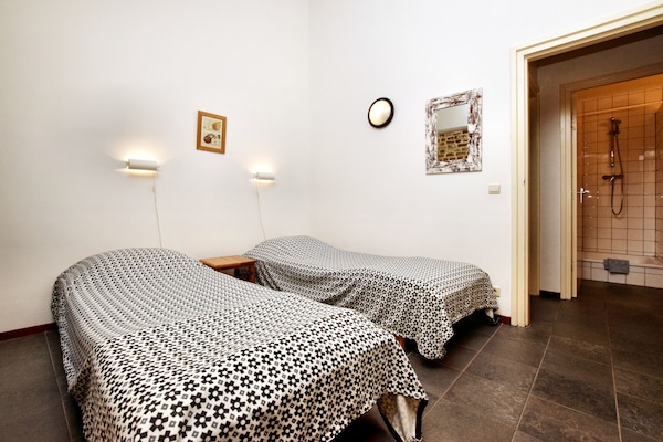 Foto van Mooi appartement in monumentale carré-boerderij tussen Luik en Maastricht - BedRoom