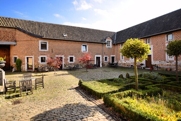 Foto van Mooi appartement in monumentale carré-boerderij tussen Luik en Maastricht - GardenSummer