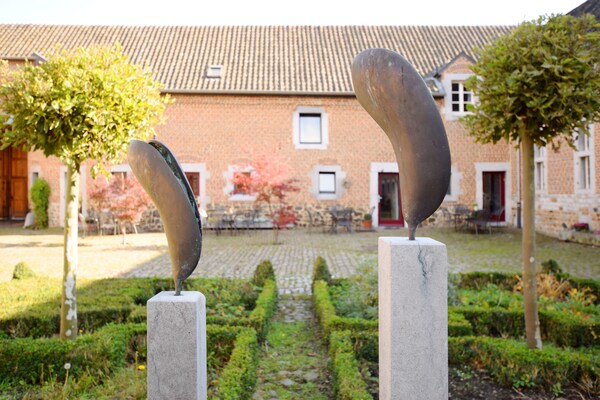 Foto van Mooi appartement in monumentale carré-boerderij tussen Luik en Maastricht - GardenSummer