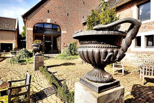 Foto van Mooi appartement in monumentale carré-boerderij tussen Luik en Maastricht - Ambiance