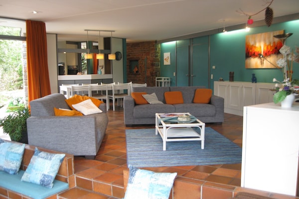 Foto van Vrijstaande vakantiewoning in de Ardennen met biozwembad - LivingRoom