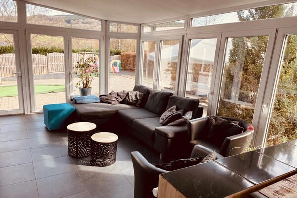 Foto van Vakantiehuis in Moutoûyet met Zwembad & Sauna - Vakantiehuis in Stoumont-Moulin du ruy - LivingRoom