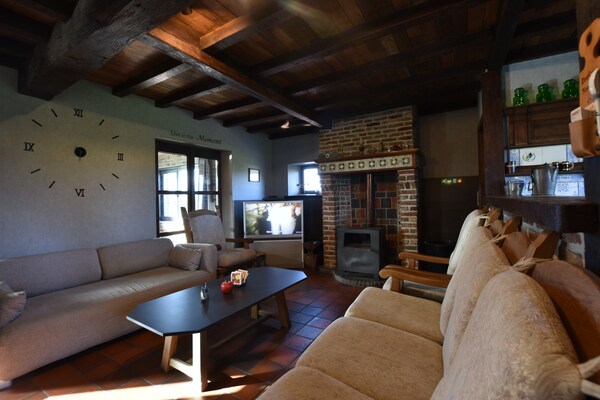 Foto van Knusse vakantiewoning in Westouter met een tuin en uitzicht - LivingRoom