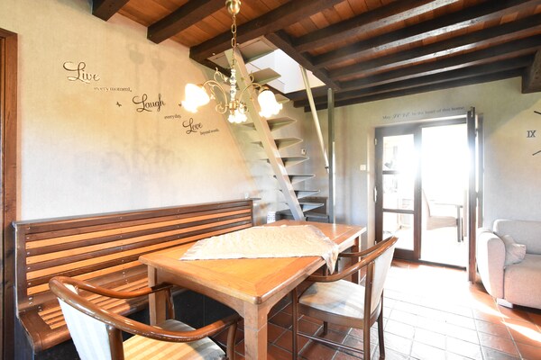 Foto van Knusse vakantiewoning in Westouter met een tuin en uitzicht - LivingRoom