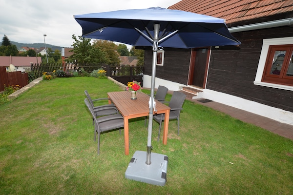 Foto van Vakantiehuis in bos met privézwembad - Vakantiehuis in Petrohrad - TerraceBalcony