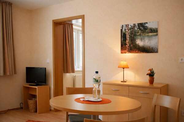 Foto van Bernsteinsee Hotel en Ferien Standaard Suite Kamer - BedRoom