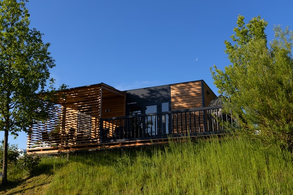 Foto van Chalet met privésauna op Vital Camp Bayerbach - Vakantiehuis in Bayerbach - ExteriorSummer