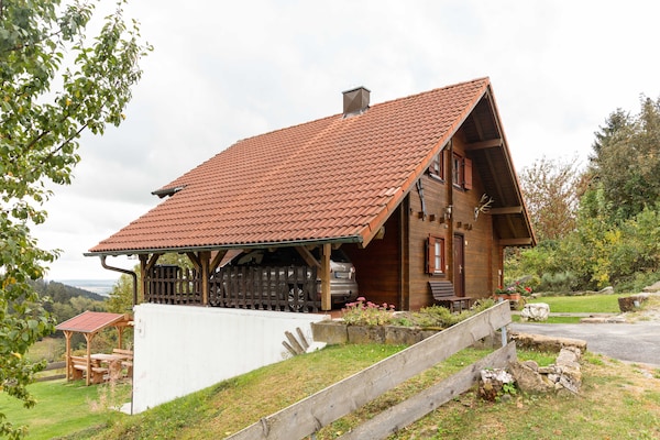 Foto van Chalet in Hinterrod Thüringen met sauna - Vakantiehuis in Waffenrod-Hinterod - ExteriorSummer