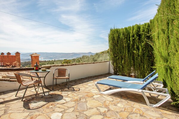 Foto van Cottage in Rute met zwembad en uitzicht - Vakantiehuis in Rute - TerraceBalcony