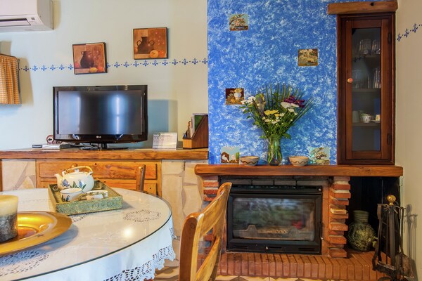 Foto van Cottage in Rute met zwembad en uitzicht - Vakantiehuis in Rute - LivingRoom
