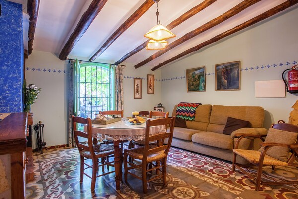 Foto van Cottage in Rute met zwembad en uitzicht - Vakantiehuis in Rute - LivingRoom