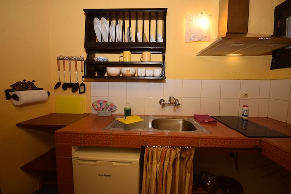 Foto van Appartement met zeezicht, alleen voor volwassenen. - Kitchen