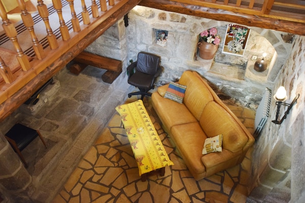 Foto van Retraite aan de rivier in La Souche - Vakantiehuis in La Souche - LivingRoom