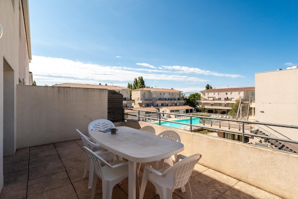 Foto van Appartement met uitzicht op het zwembad voor 6 personen - TerraceBalcony