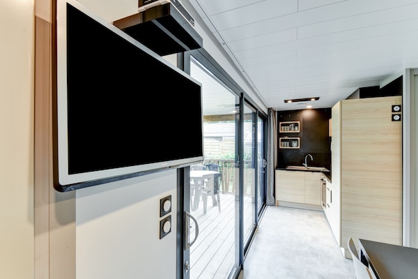 Foto van Fijn chalet in Hourtin met een gedeeld zwembad - Vakantiehuis in Hourtin - LivingRoom