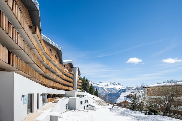 Foto van Appartement met balkon in Auris-en-Oisans - Vakantiehuis in AURIS-EN-OISANS - ExteriorWinter