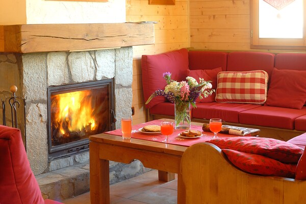 Foto van Panoramisch chalet voor groepen - Vakantiehuis in Huez - LivingRoom