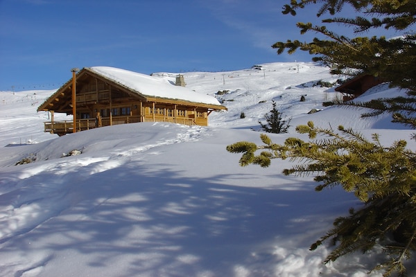 Foto van Panoramisch chalet voor groepen - Vakantiehuis in Huez - ExteriorWinter