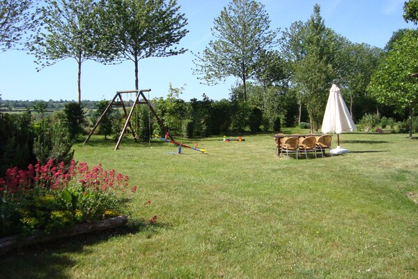 Foto van Vakantiehuis en stacaravan met ruime tuin - Vakantiehuis in Gouvets - GardenSummer