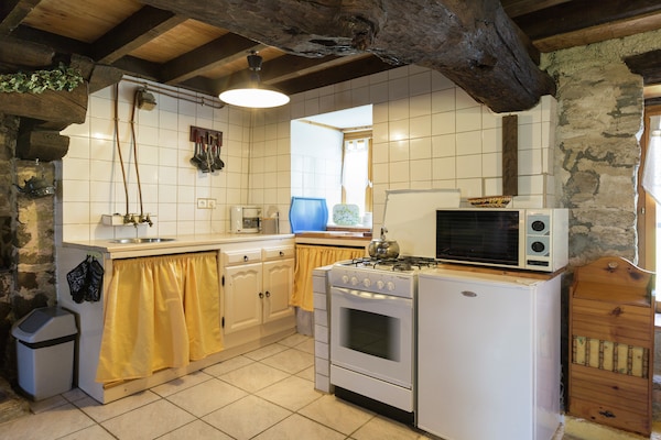 Foto van Vakantiehuis en stacaravan met ruime tuin - Vakantiehuis in Gouvets - Kitchen