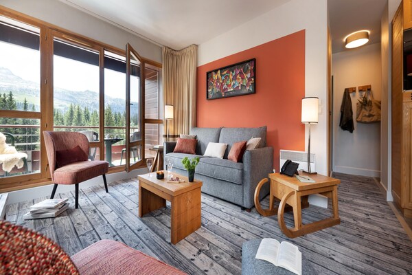 Foto van Berguitzicht vakantiehuis met balkon voor 8 - Vakantiehuis in Flaine - LivingRoom