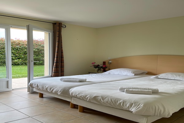 Foto van Ruime villa met privétuin, gedeeld zwembad en naast een 27-holes golfresort - BedRoom