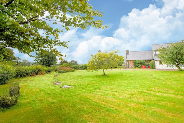 Foto van Fijn vakantiehuis in Welshpool met een tuin - Vakantiehuis in Welshpool - GardenSummer