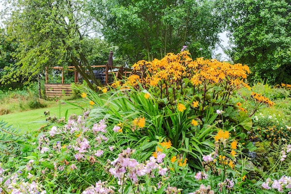 Foto van Fijn vakantiehuis in Welshpool met een tuin - Vakantiehuis in Welshpool - GardenSummer