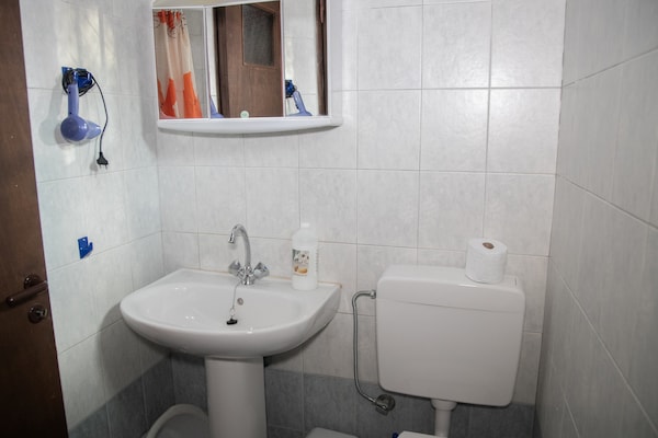 Foto van Huis in Pyrgos Dirou bij Halikia Strand - Vakantiehuis in Pyrgos Dirou - BathRoom
