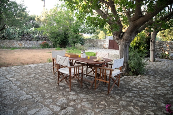 Foto van Huis in Pyrgos Dirou bij Halikia Strand - Vakantiehuis in Pyrgos Dirou - Outdoor