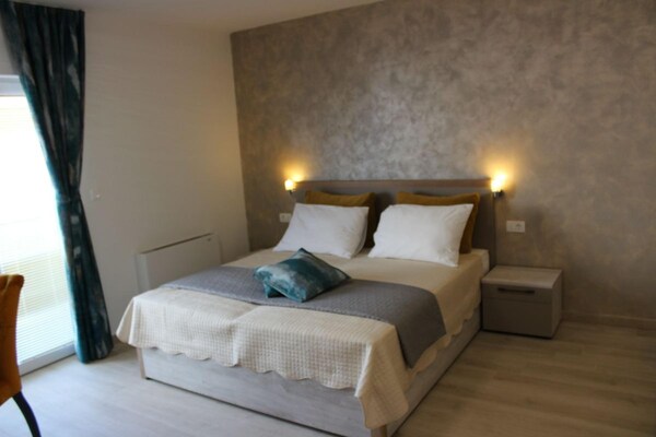 Foto van Appartement met zeezicht in Stara Novalja - Vakantiehuis in Stara Novalja - BedRoom