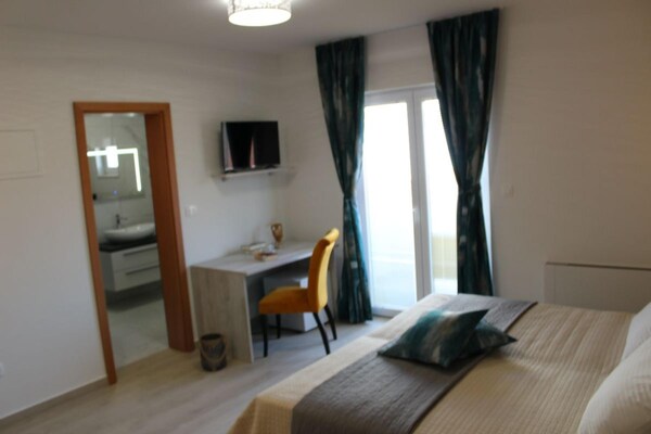 Foto van Appartement met zeezicht in Stara Novalja - Vakantiehuis in Stara Novalja - BedRoom
