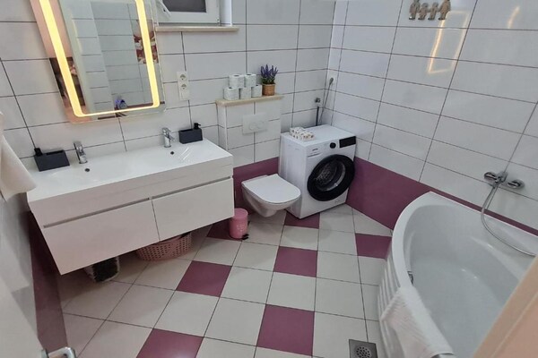 Foto van Luxury apartment Ani - Three Bedroom Apartment with terrace and Swimming pool - BathRoom