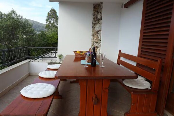 Foto van Blue Magic Apartment - Two Bedroom Apartment with Sea View and Terrace - DiningRoom
