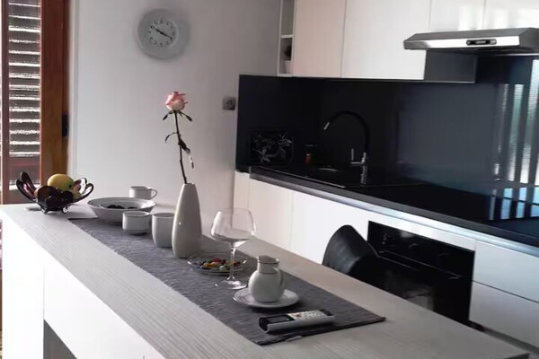 Foto van Blue Magic Apartment - Two Bedroom Apartment with Sea View and Terrace - DiningRoom