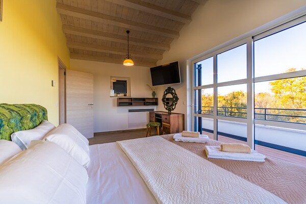 Foto van Villa in Filipana met verwarmd zwembad - Vakantiehuis in Filipana - BedRoom