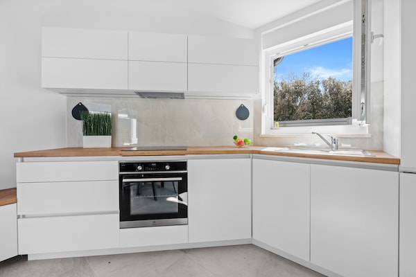 Foto van Gezellig appartement vlakbij Rock Beach - Vakantiehuis in Peroj - Kitchen
