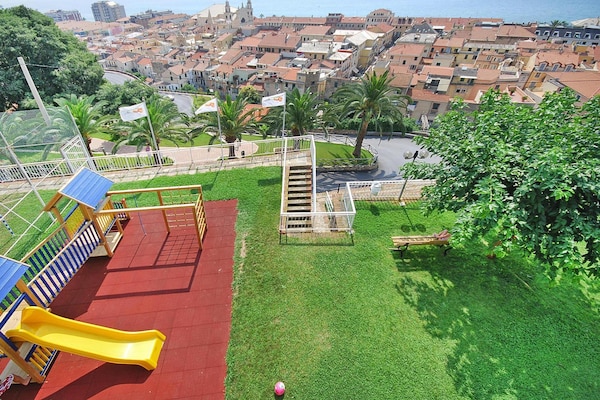 Foto van Woning in mooie residentie met gemeenschappelijk zwembad in Pietra Ligure - GardenSummer