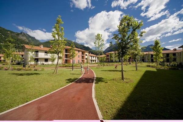 Foto van Appartement in Porlezza met balkon of tuin-voorheen TUI Ferienhaus - ExteriorSummer