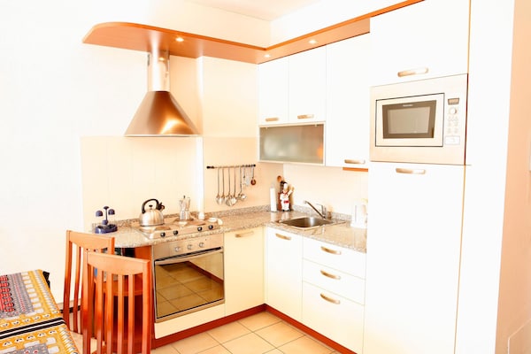 Foto van Appartement in Porlezza met balkon of tuin-voorheen TUI Ferienhaus - Kitchen