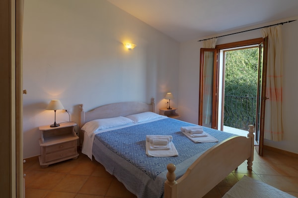 Foto van Appartement met zwembad in de Residence Badus - Vakantiehuis in Badesi - BedRoom