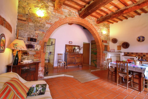 Foto van Glooiende boerderij van Val d'Orcia - Vakantiehuis in Castiglione D'orcia - LivingRoom