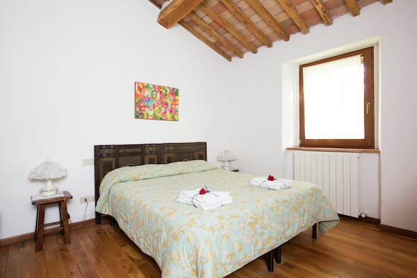 Foto van Schilderachtige Toscaanse boerderij - Vakantiehuis in Castiglione D'orcia - BedRoom