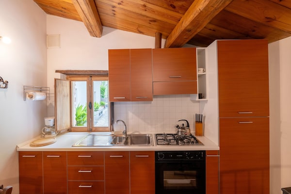 Foto van Appartement in Furlo met zoutwaterzwembad - Vakantiehuis in Acqualagna - Kitchen